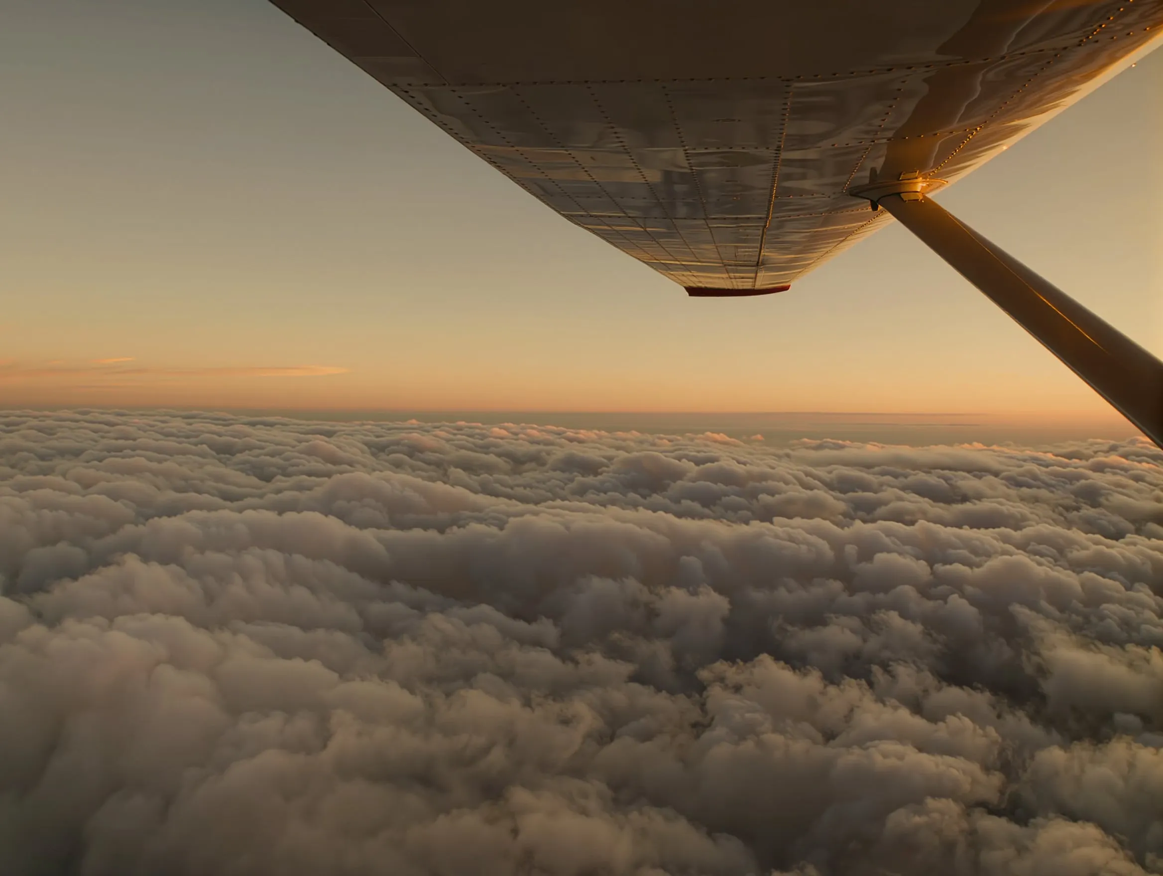 Light jet climbing above the clouds