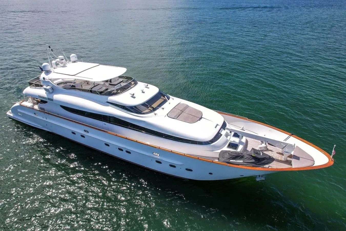 Aerial view of a white yacht underway